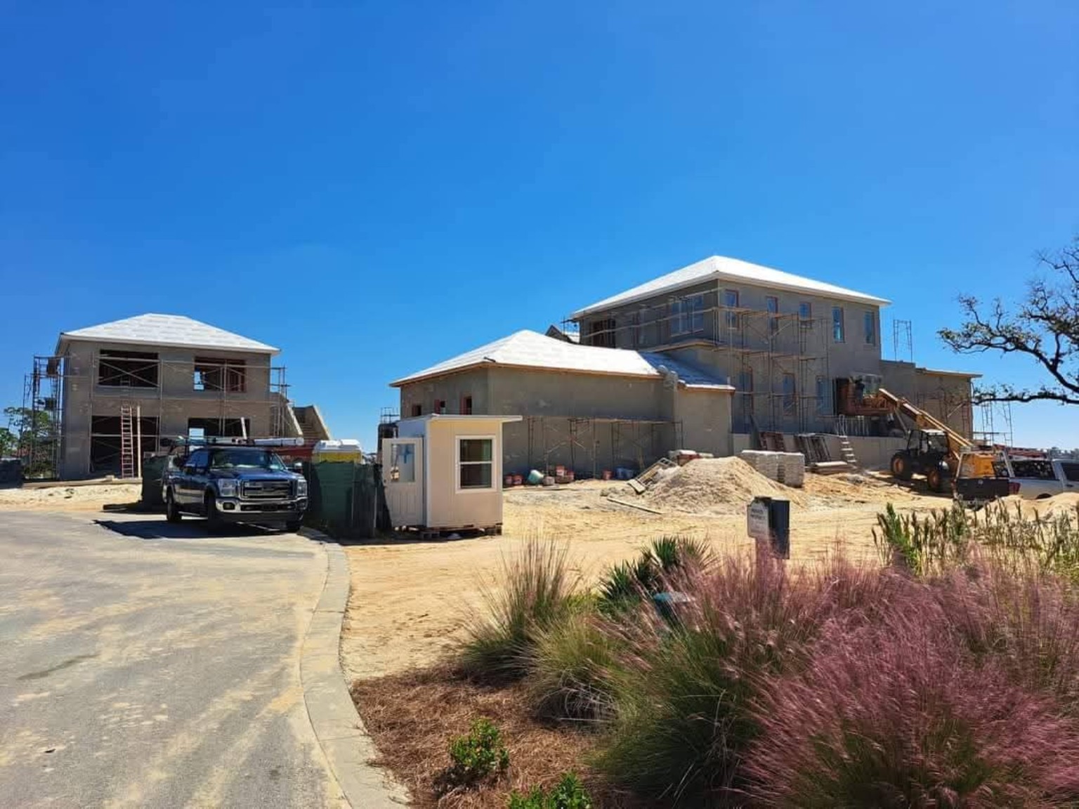Multiple buildings under construction at large development